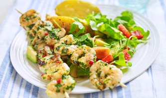 Lime chilli and coriander prawn skewers with avocado salad