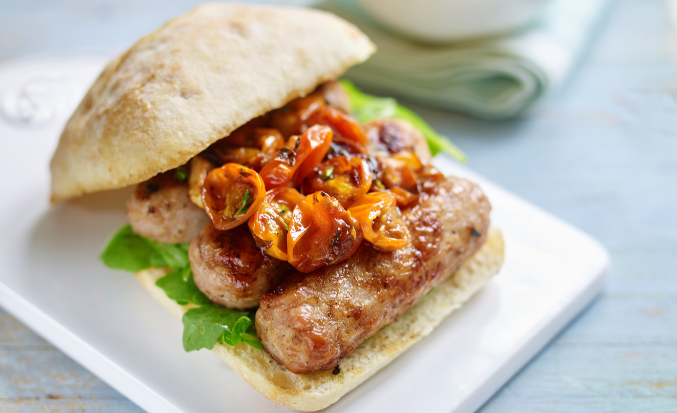 Sausage ciabatta sandwich with sticky tomato relish