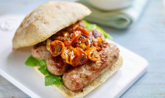 Sausage ciabatta sandwich with sticky tomato relish